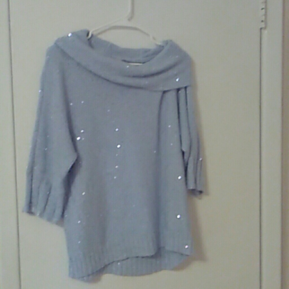 Light blue, shimmery, loose winter sweater.